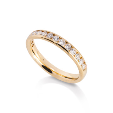 Image of a Brilliant Cut Diamond 0.45ct Channel Set Wedding Band in yellow gold