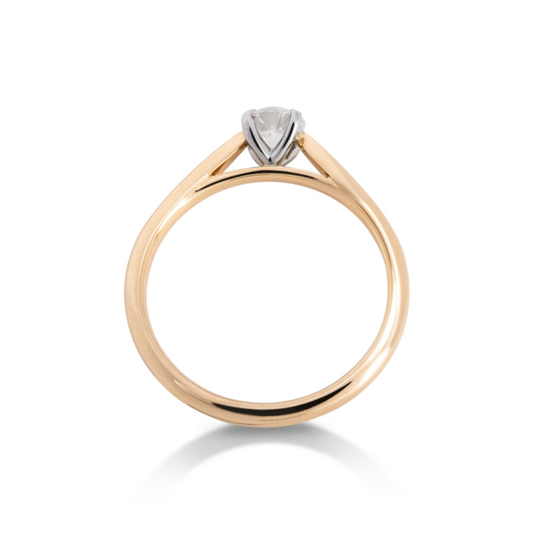 Image of a diamond ring with a gold band