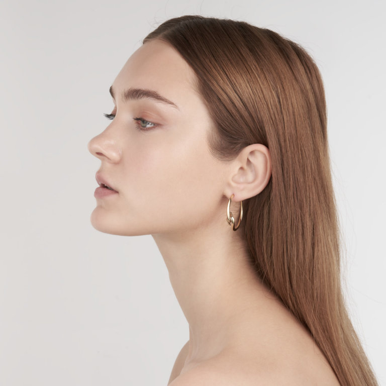 Image of a lady wearing Shaun Leane Yellow Gold Vermeil Hook Hoop Earrings