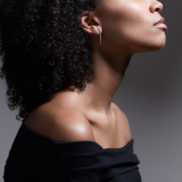 Image of a lady wearing Shaun Leane Silver Earrings