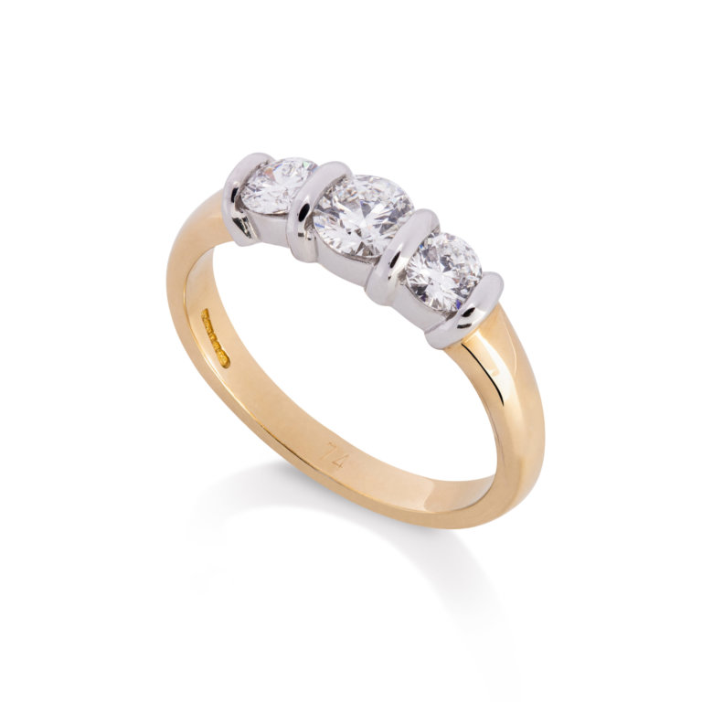 Image of a brilliant Cut 0.74ct Diamond Three Stone Ring in yellow and white gold