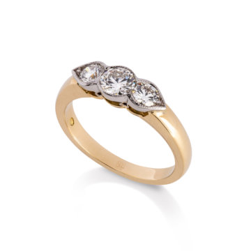 Image of a brilliant Cut 0.84ct Diamond Three Stone Ring in yellow and white gold