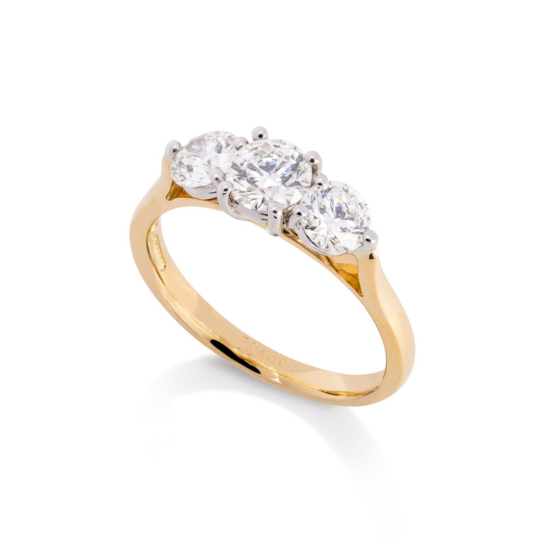 Image of a brilliant Cut 1.28ct Diamond Three Stone Ring in yellow gold and white gold