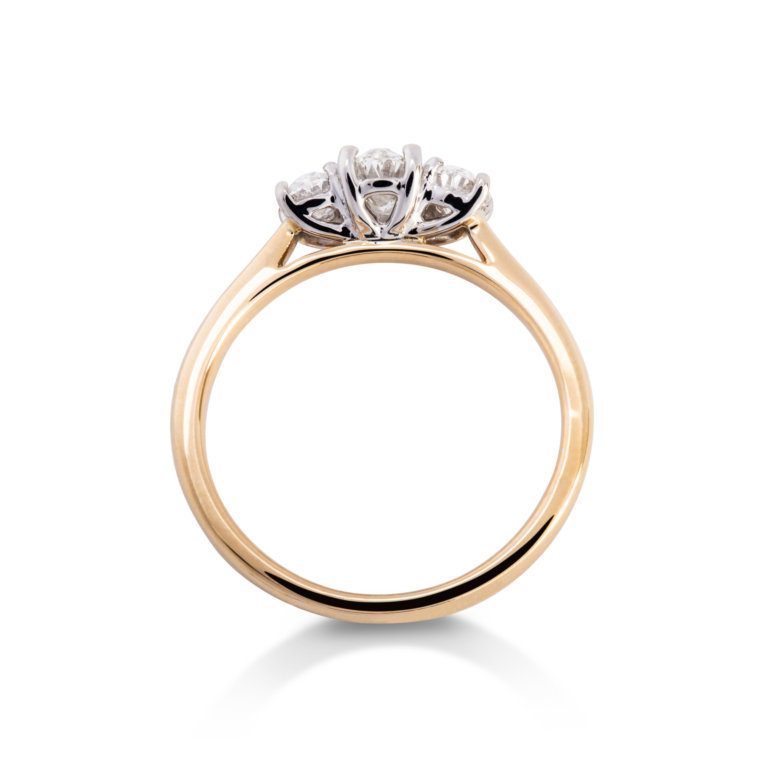 Image of an Oval Brilliant Cut 0.79ct Diamond Three Stone Ring in yellow and white gold