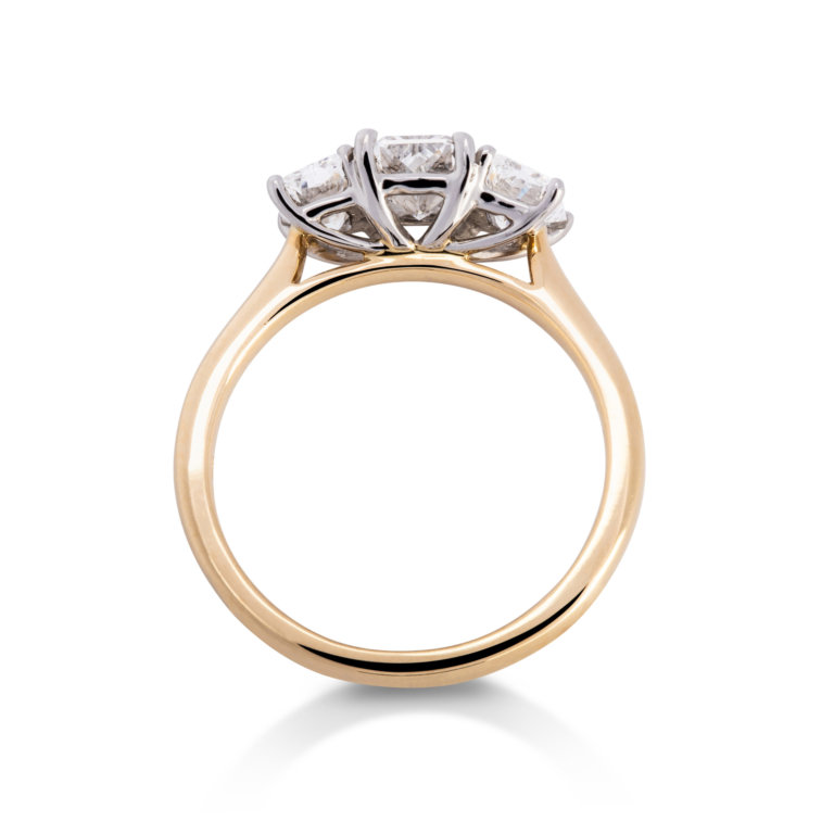 Image of a Radiant Cut 1.57ct Diamond Three Stone Ring in yellow gold and platinum