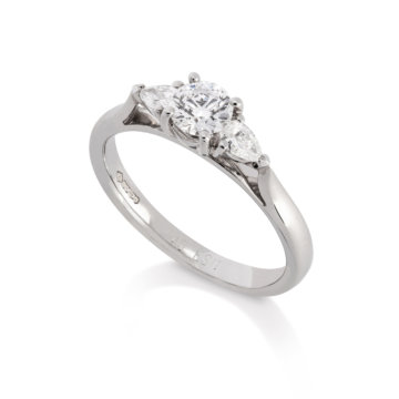 Image of a Brilliant and Pear Cut 0.57ct Diamond Three Stone Ring in platinum