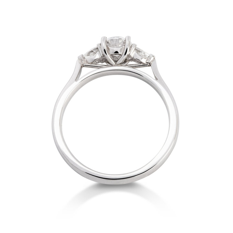 Image of a Brilliant and Pear Cut 0.57ct Diamond Three Stone Ring in platinum