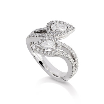 Image of a Pear and Brilliant Cut Diamond Halo Crossover Ring in platinum