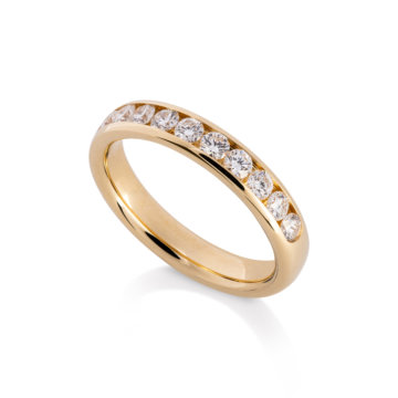 Image of a Brilliant Cut Diamond 0.70ct Channel Set Wedding Band in yellow gold