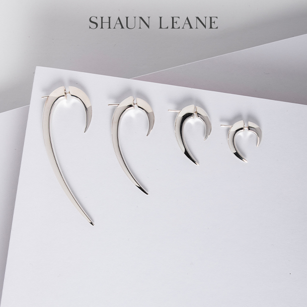 Image of four Shaun Leane hook earrings in graduating sizes