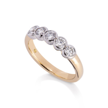 Image of a Brilliant Cut 0.80ct Diamond Rub-Over Five Stone Ring in yellow and white gold
