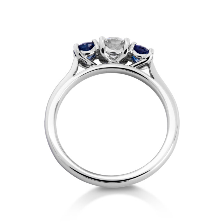 Image of a diamond and Sapphire Three Stone Ring in platinum