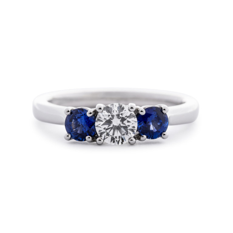 Image of a Diamond and Sapphire Three Stone Ring in platinum