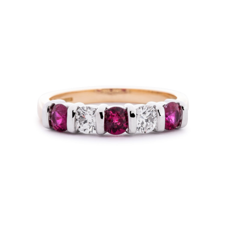 Image of a ruby and Diamond Five Stone Bar Set Ring in yellow and white gold