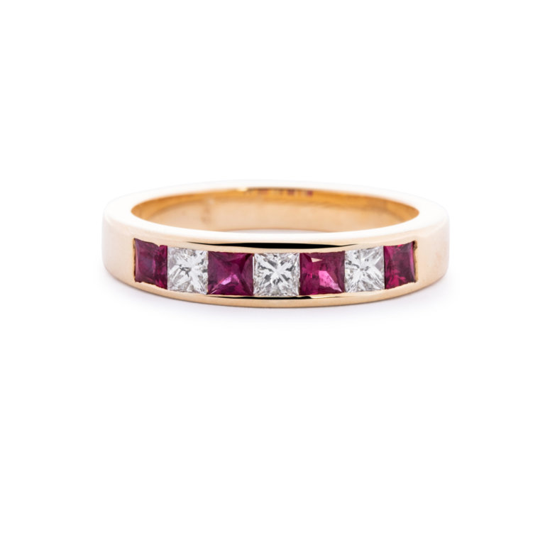 Image of a Ruby and Diamond Channel Set Eternity Ring in yellow gold