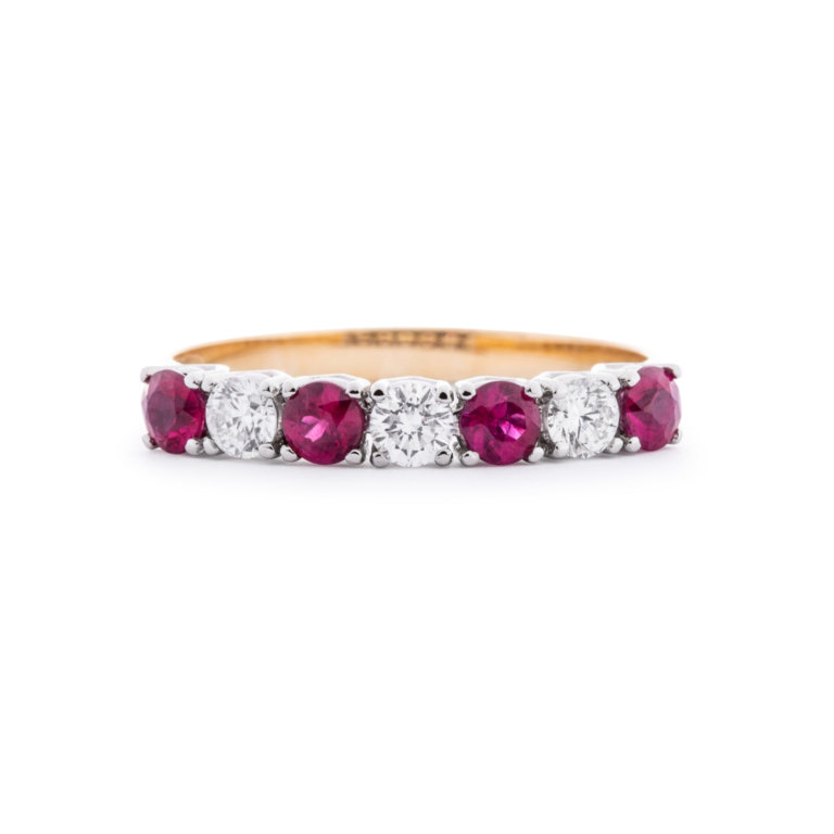 Image of a Ruby and Diamond Claw Set Eternity Ring in yellow gold and platinum