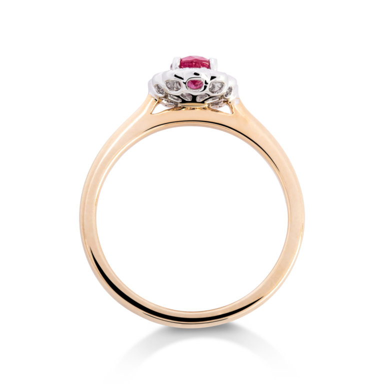 Image of a Ruby and Diamond Oval Cluster Ring in yellow gold
