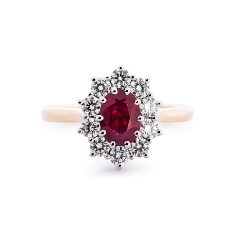 Image of a Ruby and Diamond Classic Oval Cluster Ring in yellow gold