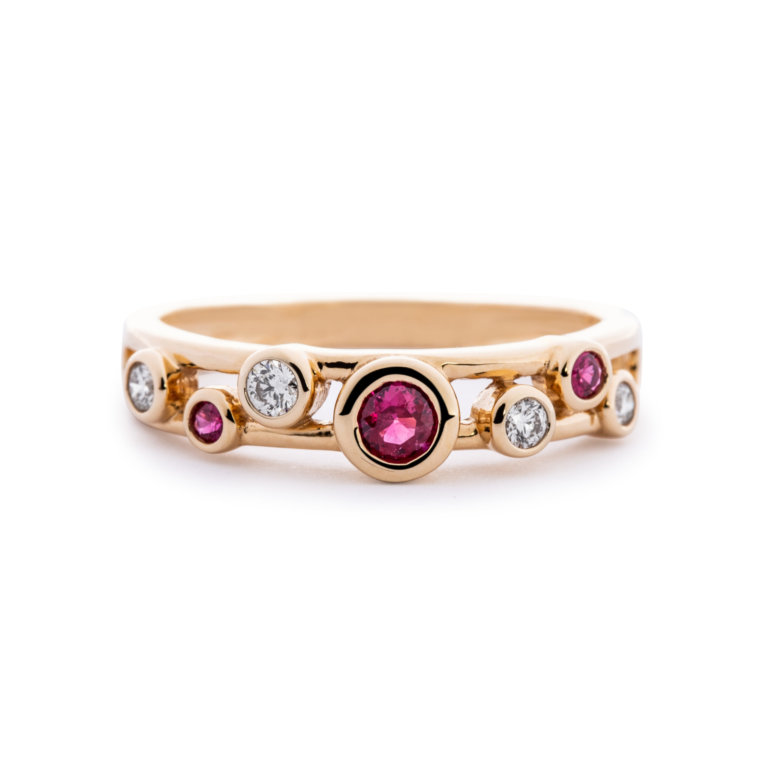 Image of a Ruby and Diamond Scatter Ring in yellow gold