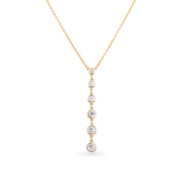 Image of a gold pendant necklace with six graduating size diamonds on a drop chain design