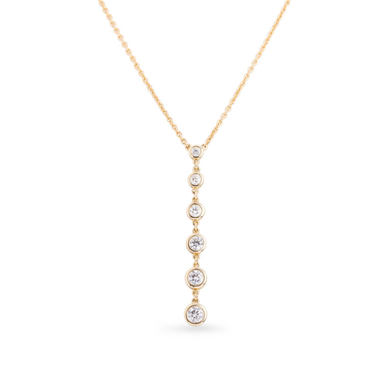 Image of a gold pendant necklace with six graduating size diamonds on a drop chain design