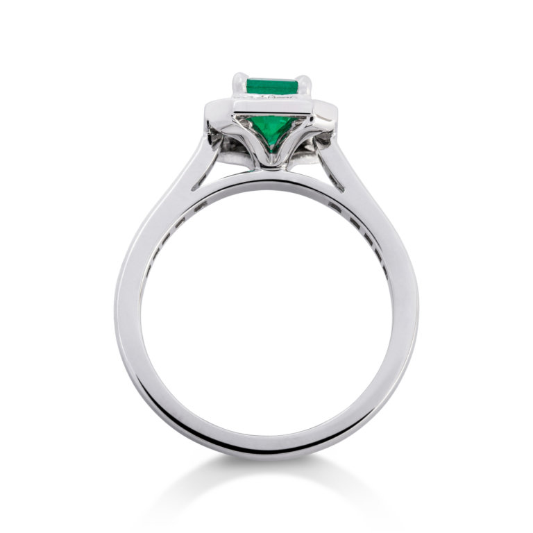 Image of an emerald and Diamond Rectangular Halo Ring set in white gold