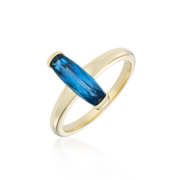 Blue Topaz and Yellow Gold Barrel Ring